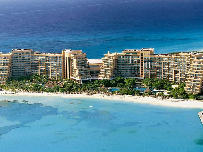 An aerial view of Grand Fiesta Americana Coral Beach Cancún — the resort's iconic beachfront position on the Hotel Zone.
