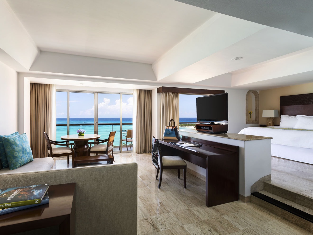 A Master King Suite with panoramic Caribbean views — spacious, elegant, and designed for the discerning traveler.